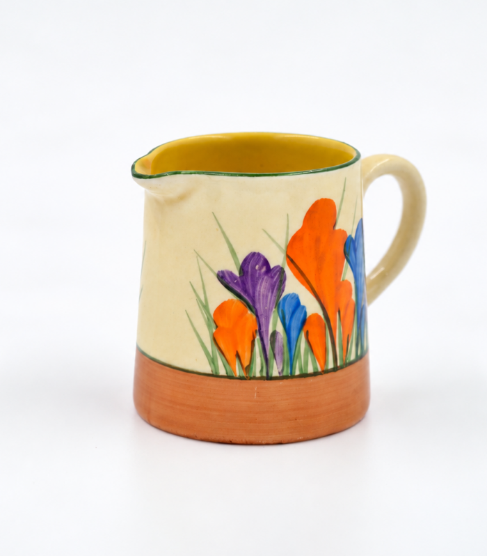 Original Clarice Cliff cream jug in the colourful Autumn Crocus design, circa 1929. A beautiful Art Deco collectable presented in perfect condition.